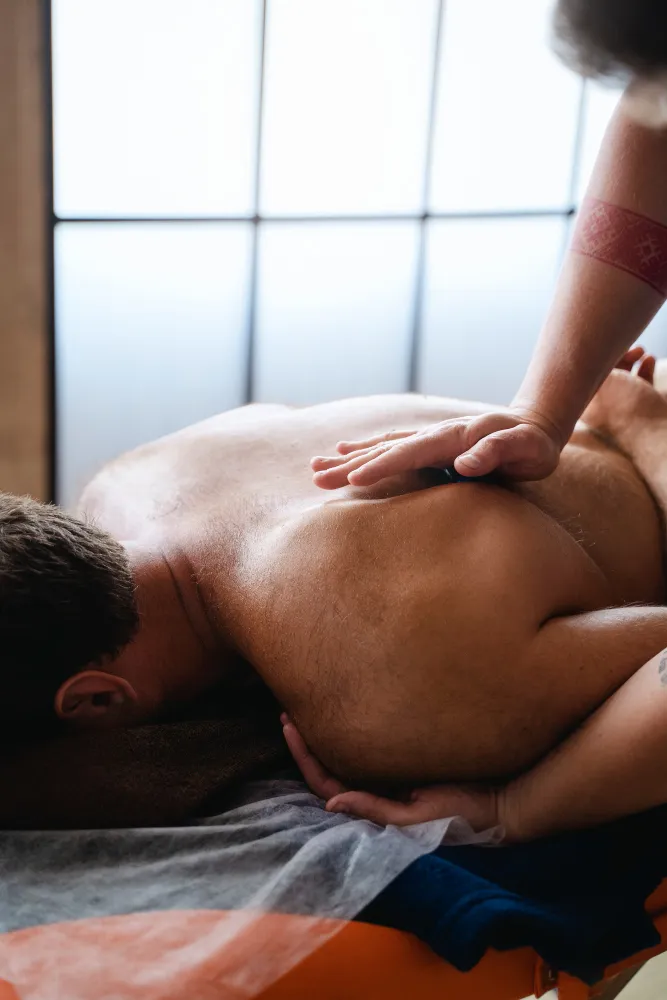 Professional male massage service at home for busy executives and corporate professionals in GK2 Delhi.