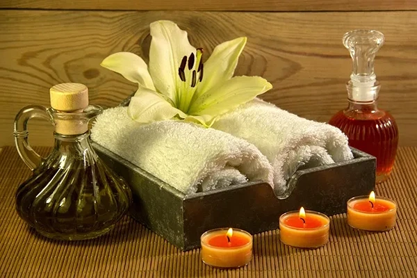 Aromatherapy massage using essential oils to reduce stress improve mood and support better sleep