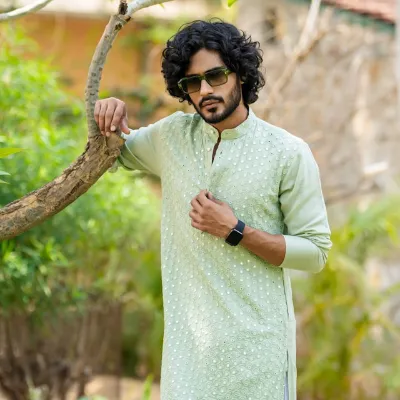 Satisfied client sharing a positive experience after a professional male full-body massage