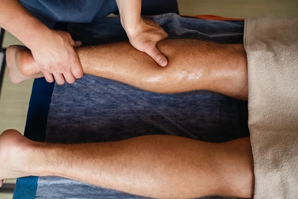 Foot reflexology massage in Delhi targeting specific pressure points to stimulate blood flow and relieve fatigue from standing all day.