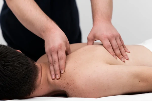 Professional deep tissue massage for chronic muscle pain and stiff neck relief in Delhi.